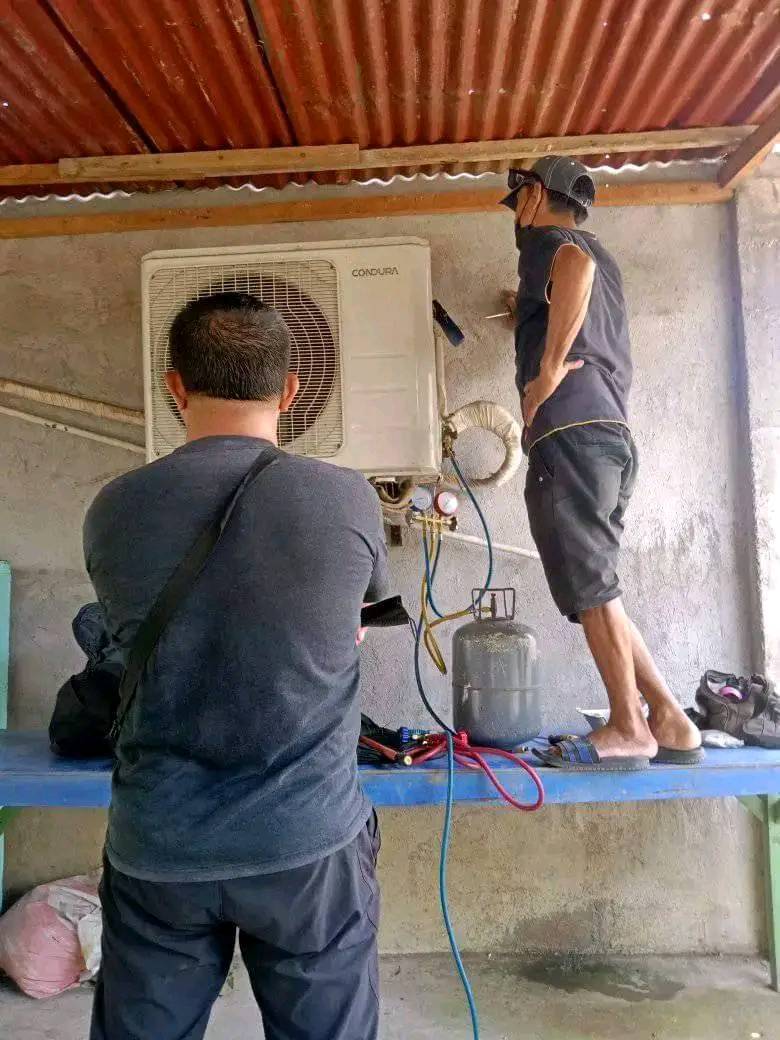 NJ Aircon Services technicians performing aircon service in Alabel Sarangani Province